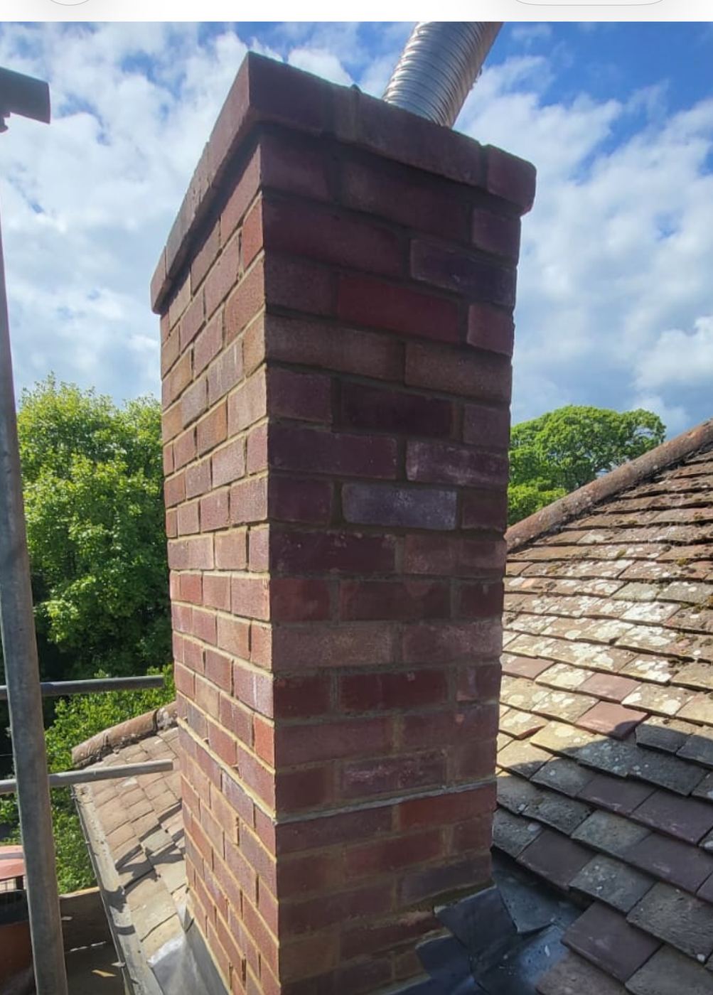 Rebuilt brick chimney stack