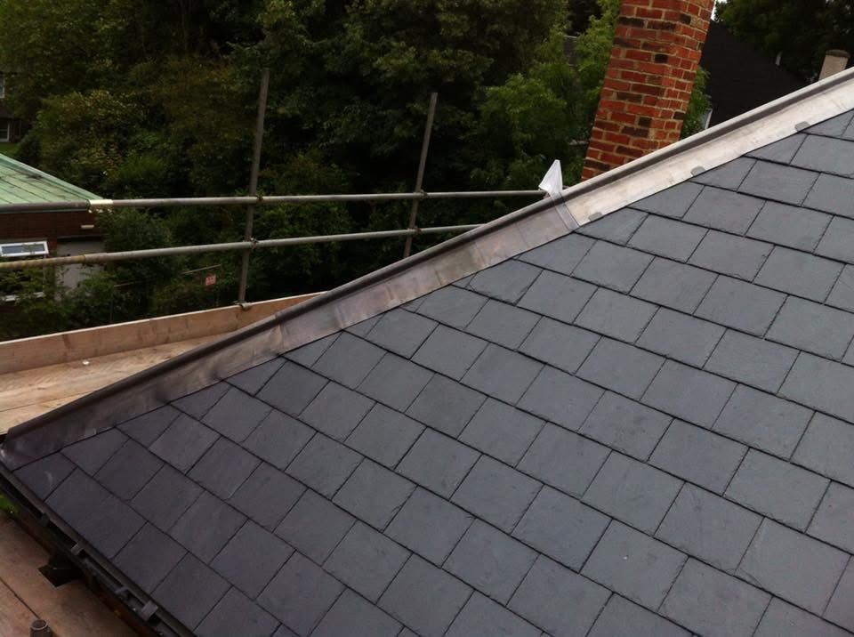 Lead ridge flashing on slate roof